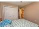 Tranquil bedroom with a double closet and view to an ensuite bathroom at 3879 Mallard Way, Little River, SC 29566