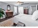 Comfortable bedroom features a ceiling fan, dresser with television, and soothing gray walls at 3907 Stillwood Dr., Myrtle Beach, SC 29588