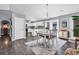 Dining area with a chandelier and open access to the kitchen and living areas at 3907 Stillwood Dr., Myrtle Beach, SC 29588