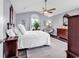Spacious main bedroom featuring vaulted ceilings, natural light, and modern furnishings at 3907 Stillwood Dr., Myrtle Beach, SC 29588