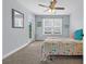 Comfortable bedroom featuring a ceiling fan and natural light at 3925 Riley-Hampton Dr., Myrtle Beach, SC 29579