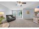 Inviting living room offering comfortable seating and a ceiling fan at 3925 Riley-Hampton Dr., Myrtle Beach, SC 29579