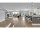 Open concept living space with fireplace and kitchen island at 3925 Riley-Hampton Dr., Myrtle Beach, SC 29579