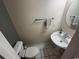 Powder room with pedestal sink and tile flooring at 3965 Forsythia Ct. # 202, Myrtle Beach, SC 29588