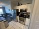 Bright kitchen featuring stainless steel appliances and white cabinetry for a modern look at 3965 Forsythia Ct. # 202, Myrtle Beach, SC 29588