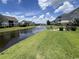 Scenic pond with fountain surrounded by lush landscaping at 3965 Forsythia Ct. # 202, Myrtle Beach, SC 29588