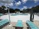 Outdoor community pool area with lounge chairs and manicured landscaping at 3965 Forsythia Ct. # 202, Myrtle Beach, SC 29588