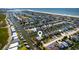 Aerial view of the home on the waterway showing it's location and neighborhood at 401 Marlin St., Sunset Beach, NC 28468