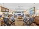 Expansive living room featuring comfortable seating, hardwood floors, and fireplace at 401 Marlin St., Sunset Beach, NC 28468