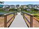 Home's private dock, with multiple slips and quick access to the waterway and a view of the neighborhood at 401 Marlin St., Sunset Beach, NC 28468