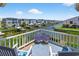 Picturesque waterfront view with colorful homes, private docks, and serene water views, ideal for relaxation at 401 Marlin St., Sunset Beach, NC 28468
