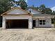 An exterior view of a house under construction with an attached two-car garage at 4032 Copperhead Rd., Conway, SC 29527