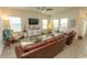 Bright living room with stylish furnishings, hardwood floors, and abundant natural light at 435 Rollins Dr., Longs, SC 29568