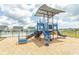 Community playground with slides and play equipment, with a pool in the background at 435 Rollins Dr., Longs, SC 29568