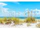 Stunning beachfront scene with sea oats in the foreground and the ocean visible in the distance at 4355 Rivergate Ln. # F, Little River, SC 29566