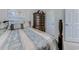 Bedroom featuring floral patterned bedding and dark wood dresser at 4355 Rivergate Ln. # F, Little River, SC 29566