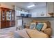 Bright living area with display cabinet open to kitchen with stainless appliances at 4355 Rivergate Ln. # F, Little River, SC 29566