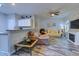 Inviting living space with ample seating, fireplace, and kitchen view at 4355 Rivergate Ln. # F, Little River, SC 29566