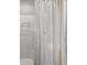 Shower with seashell patterned curtain and convenient shelving at 4355 Rivergate Ln. # F, Little River, SC 29566