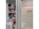 Well-organized closet with shelves stocked with toiletries, cleaning supplies and fresh towels at 4355 Rivergate Ln. # F, Little River, SC 29566