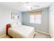 Comfortable bedroom with a ceiling fan and a window with blinds at 4522 N Plantation Harbour Dr. # E7, Little River, SC 29566
