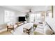 Bright and airy living room with a ceiling fan and sliding glass doors to a balcony at 4522 N Plantation Harbour Dr. # E7, Little River, SC 29566