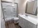 This bathroom has a walk-in shower and white cabinets at 468 River Oak Dr. # 66D, Myrtle Beach, SC 29579