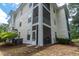 Exterior angle of the building with a view of the screened patio at 468 River Oak Dr. # 66D, Myrtle Beach, SC 29579