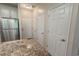 Well-lit kitchen featuring a stainless steel refrigerator and granite countertops at 468 River Oak Dr. # 66D, Myrtle Beach, SC 29579