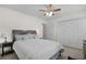 Comfortable bedroom with a ceiling fan, closet, and a plush king-size bed at 483 Oakmont Dr., Myrtle Beach, SC 29579