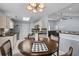 Open concept kitchen with an island, modern appliances, granite countertops, and a breakfast nook at 483 Oakmont Dr., Myrtle Beach, SC 29579