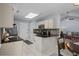 Spacious kitchen featuring sleek countertops, mosaic backsplash, stainless steel appliances, and an open layout at 483 Oakmont Dr., Myrtle Beach, SC 29579