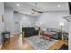 Inviting living room featuring hardwood floors, vaulted ceilings, and comfortable sofas at 483 Oakmont Dr., Myrtle Beach, SC 29579
