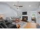 Cozy living room with vaulted ceilings, a fireplace, and hardwood floors at 483 Oakmont Dr., Myrtle Beach, SC 29579