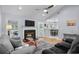 Open living area with vaulted ceilings, a fireplace, and a view into the kitchen at 483 Oakmont Dr., Myrtle Beach, SC 29579