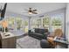 Inviting sunroom filled with natural light, comfortable seating, and peaceful views at 483 Oakmont Dr., Myrtle Beach, SC 29579