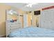 Charming bedroom with white furniture, including a dresser and white headboard on a full-sized bed at 5000 N Ocean Blvd. # E-2, North Myrtle Beach, SC 29582