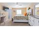 Bright bedroom with light walls, a white ceiling fan, and white trim at 5000 N Ocean Blvd. # E-2, North Myrtle Beach, SC 29582