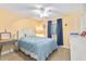 Comfortable bedroom with a full-sized bed, nautical decor, and a bright window with anchor curtains at 5000 N Ocean Blvd. # E-2, North Myrtle Beach, SC 29582