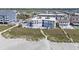 Aerial view of the condo building close to the beach, with manicured lawns and community pool at 5000 N Ocean Blvd. # E-2, North Myrtle Beach, SC 29582