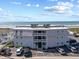 Three story condo building with ocean view, ample parking and beach access for easy enjoyment at 5000 N Ocean Blvd. # E-2, North Myrtle Beach, SC 29582