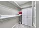 Well-organized closet space with shelving, a storage unit and neutral color scheme at 505 41St Ave. S, North Myrtle Beach, SC 29582