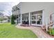 Backyard with spacious patio, stairs to upper deck, and well-maintained lawn at 505 41St Ave. S, North Myrtle Beach, SC 29582