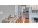Inviting hallway with hardwood floors, charming decor, and views into other rooms of the home at 505 41St Ave. S, North Myrtle Beach, SC 29582