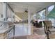 Covered patio featuring an outdoor kitchen with stainless steel grill and built-in sink at 505 41St Ave. S, North Myrtle Beach, SC 29582