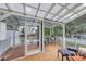 Relaxing screened patio featuring comfortable seating with a view of the surrounding landscape at 505 41St Ave. S, North Myrtle Beach, SC 29582