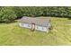 Aerial view of a home showing the house and well-manicured lawn at 580 Circle M Rd., Longs, SC 29568