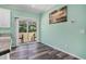 Dining area with sliding glass door leading to a deck, and modern decor at 580 Circle M Rd., Longs, SC 29568