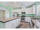 View of the kitchen featuring an island with stone countertops and stainless steel appliances at 580 Circle M Rd., Longs, SC 29568