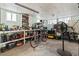 Unfinished basement with workbench, shelving, and tools, offering potential for customization and storage at 5867 Rosewood Dr., Myrtle Beach, SC 29588